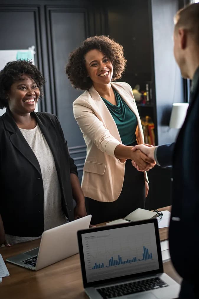Business partners shaking hands on an agreement