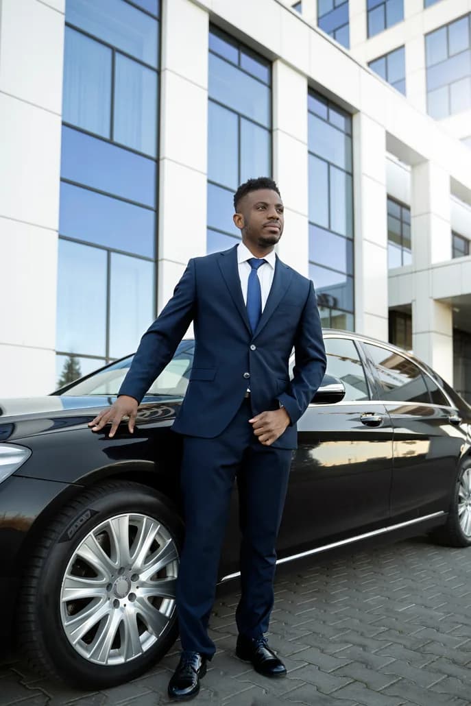 A professional driver at the wheel during a scheduled transfer